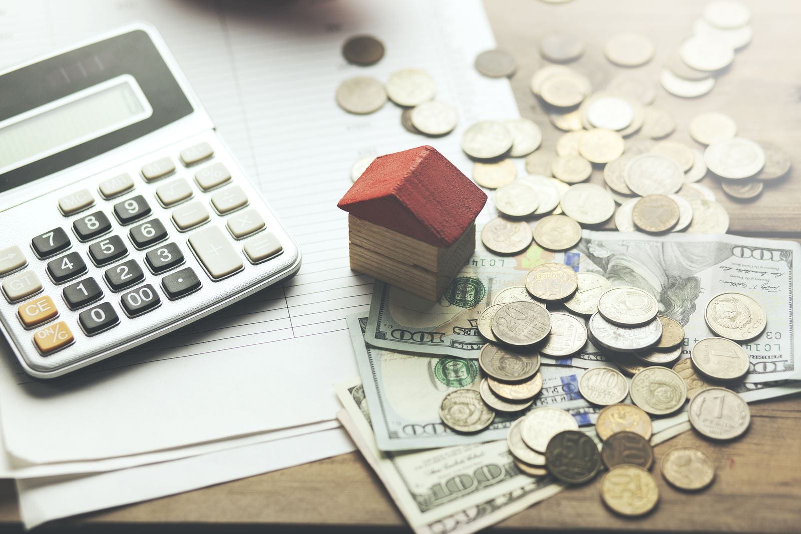 Bigstock Money Calculator With House M 233904865